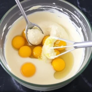 Add the eggs, one at a time, beating well after each addition.