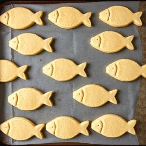 Bake for 12-15 minutes or until the fish shaped biscuits are golden brown. Let cool before serving.