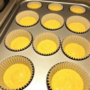 Fill each cupcake liner with the batter