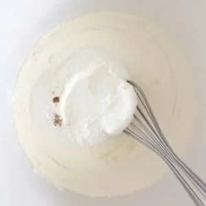 In a large bowl, whisk together the flour, sugar, baking powder, and salt.