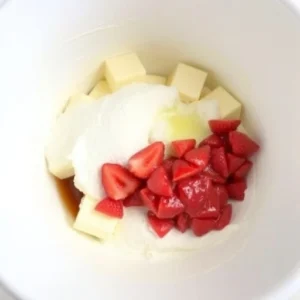 In a separate bowl, cream the softened butter and sugar together until light and fluffy. Add the eggs, one at a time,